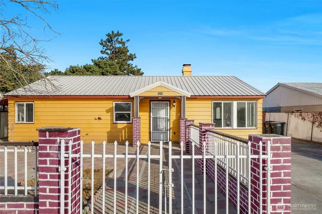 a front view of a house with a porch