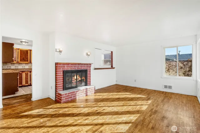 a view of a livingroom with a fireplace
