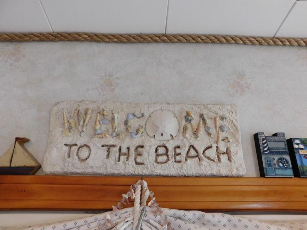 218 Old Wharf Road, Unit 218 Dennis, MA 02639 - Photo 28 of 32 a view of a room with window and a rug
