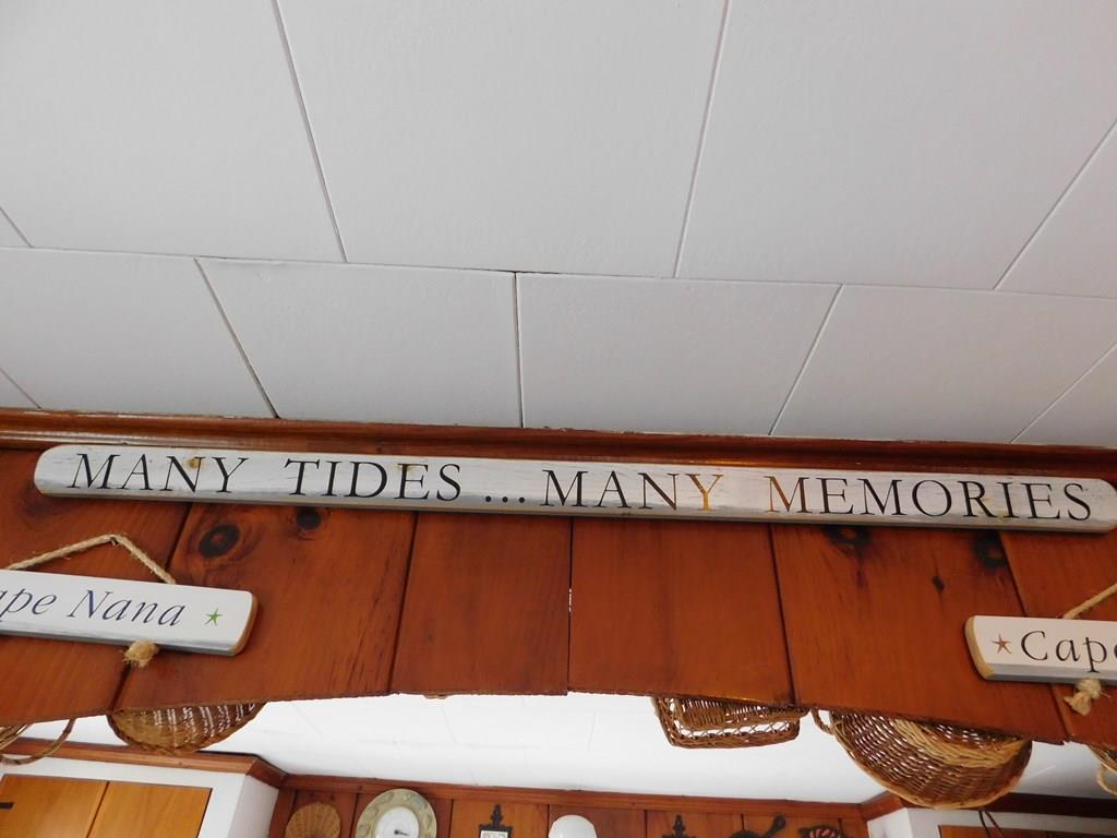 218 Old Wharf Road, Unit 218 Dennis, MA 02639 - Photo 29 of 32 a close up of a street sign