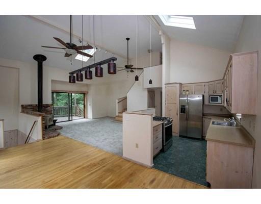 182 Judd Road Otis, MA 01253 - Photo 3 of 26 a kitchen with refrigerator and microwave