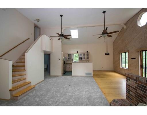 182 Judd Road Otis, MA 01253 - Photo 4 of 26 a very nice looking room with a ceiling fan