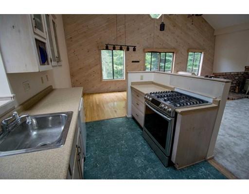 182 Judd Road Otis, MA 01253 - Photo 6 of 26 a kitchen that has a sink and a stove