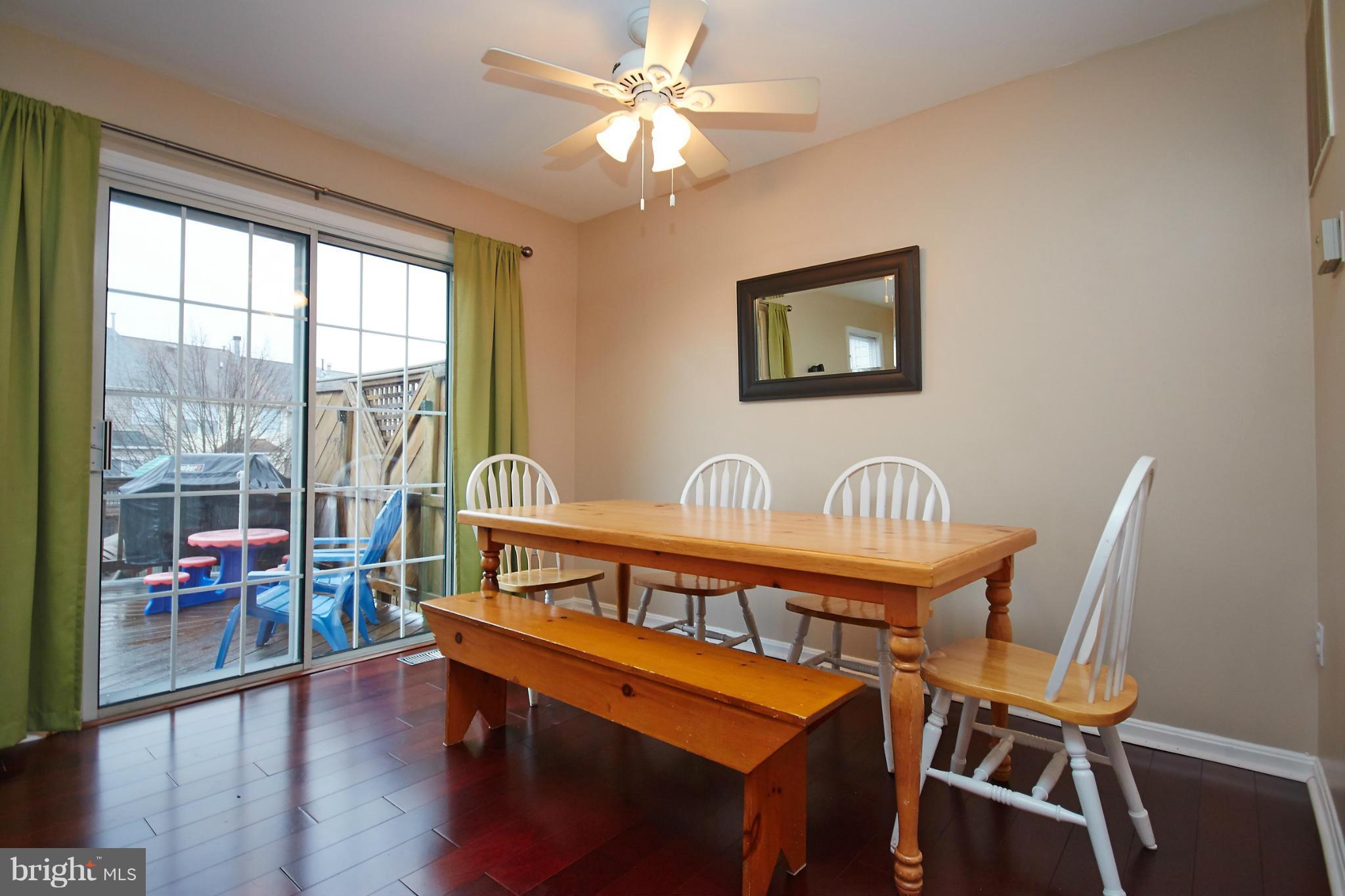 8461 Tackhouse Loop Gainesville, VA 20155 - Photo 12 of 29 a bedroom with furniture and a window