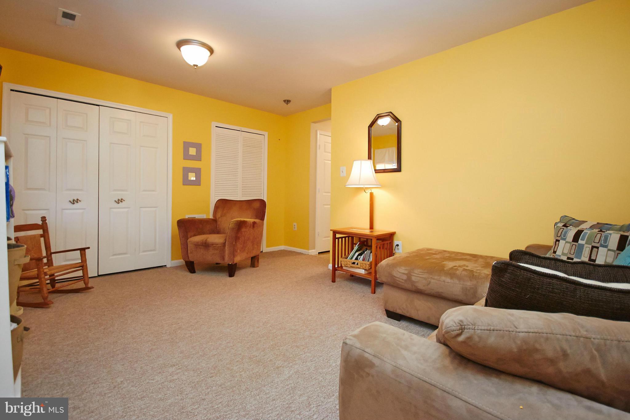 8461 Tackhouse Loop Gainesville, VA 20155 - Photo 21 of 29 a living room with furniture