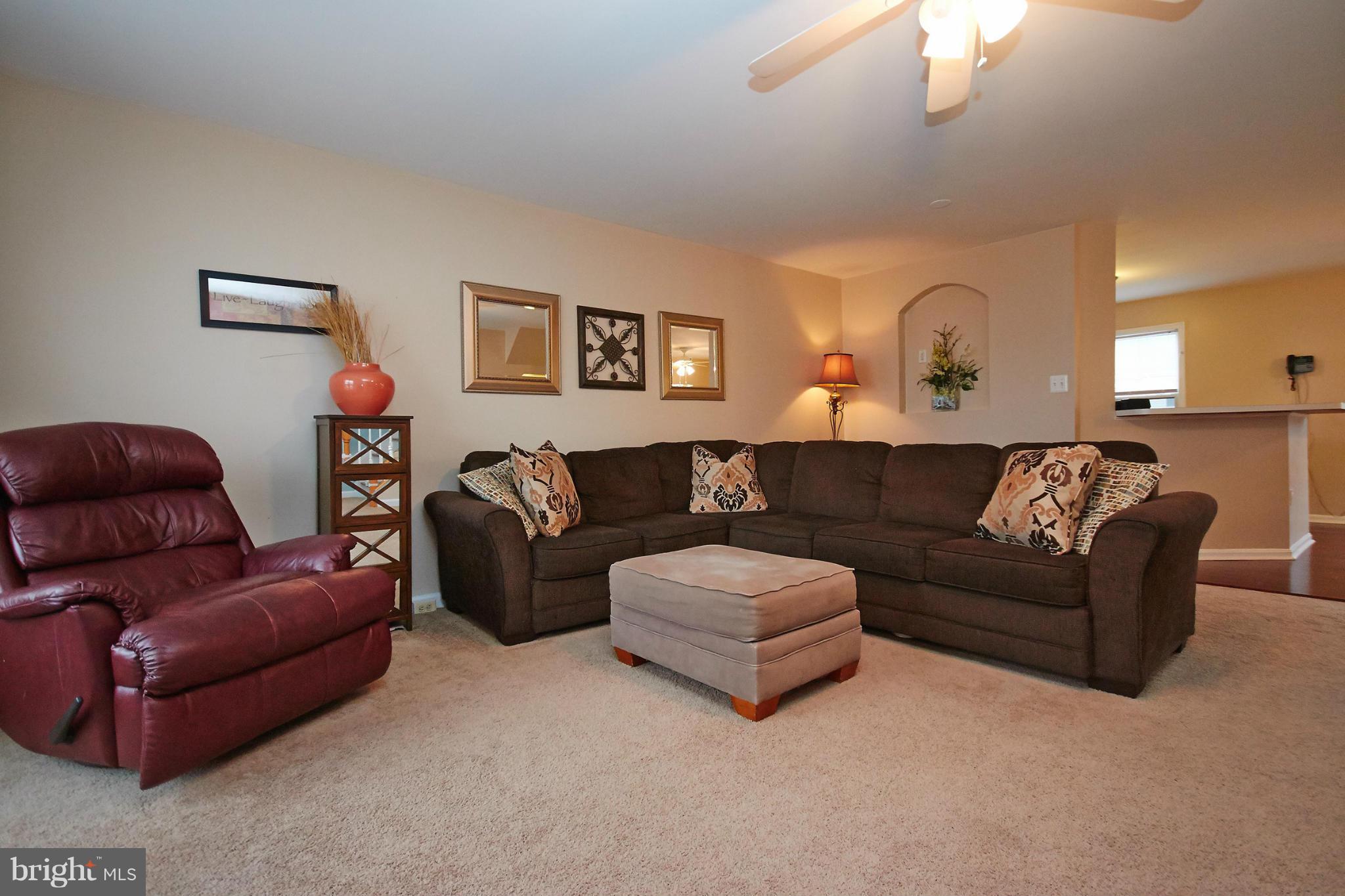 8461 Tackhouse Loop Gainesville, VA 20155 - Photo 6 of 29 a living room with furniture