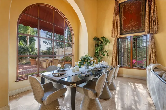 a large kitchen with stainless steel appliances granite countertop a stove and a sink