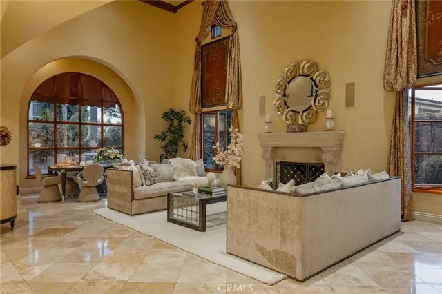 a view of a swimming pool with a garden and trees