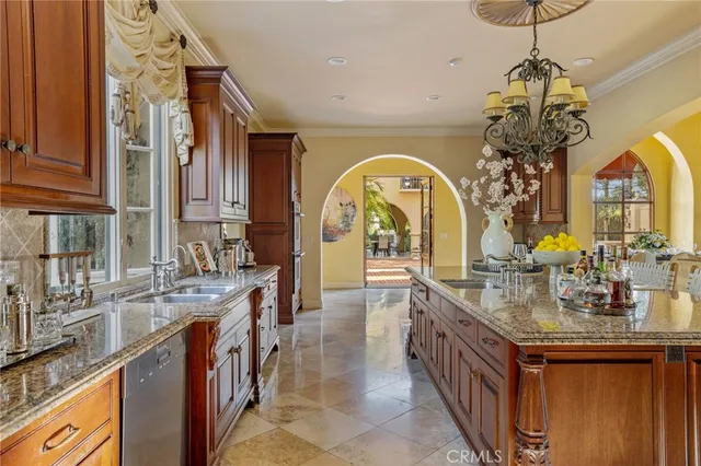 a living room with a couch and a potted plant