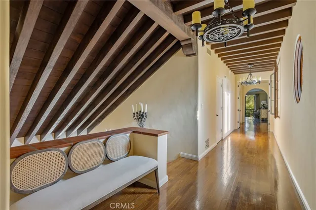 a view of a livingroom with furniture and a table