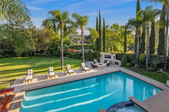 a bathroom with a sink a vanity and a mirror