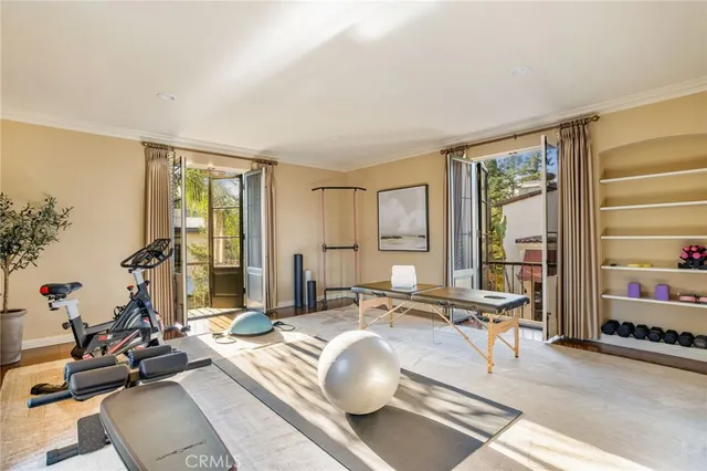 a bathroom with a toilet sink shower and mirror