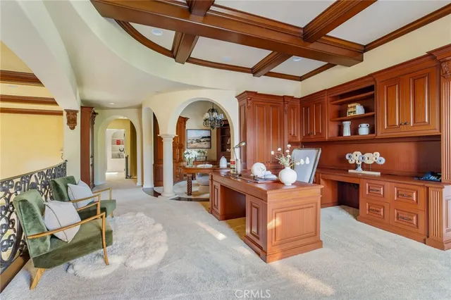 a view of a yard with plants and trees