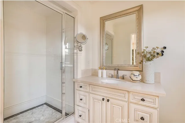 a front view of a house with swimming pool garden and patio