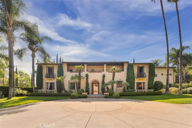 a large building with trees in front of it