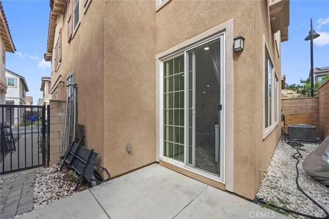 a view of a door and a window