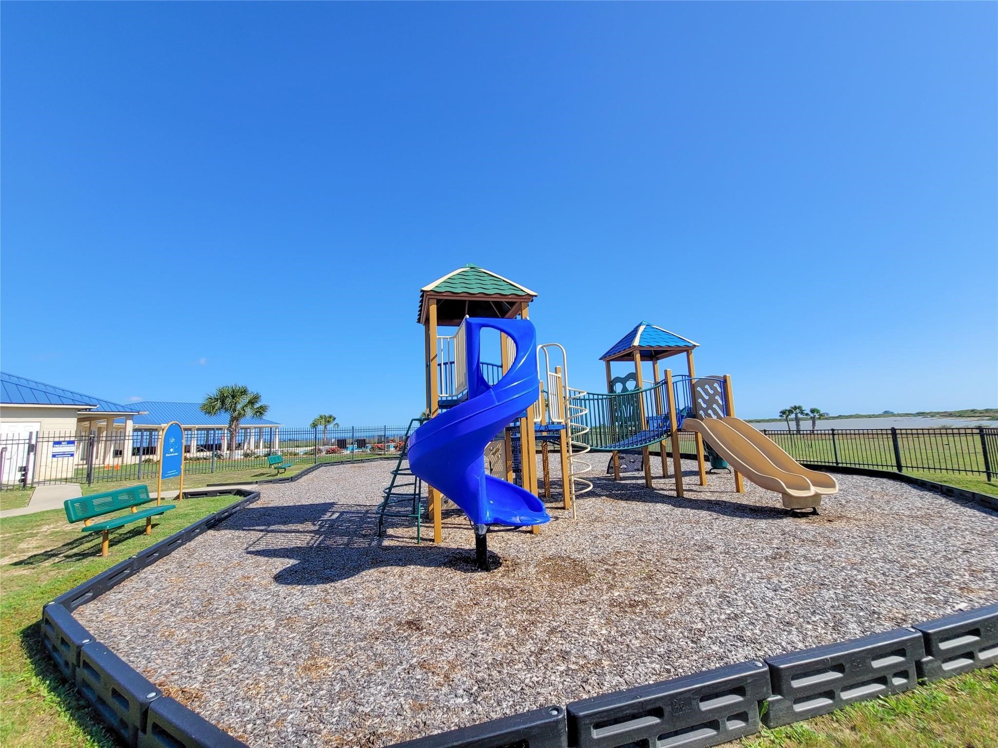 3038 Coastal Spgs Loop Palacios, TX 77465 - Photo 4 of 6 a view of a park with slide