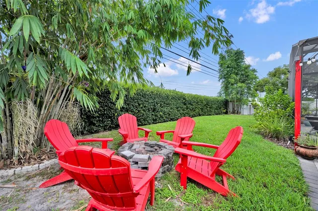 a view of an outdoor sitting area in a yard