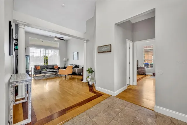 a view of a living room and dining room
