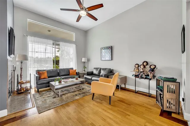 a living room with furniture and a window