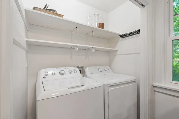 a utility room with dryer and washer