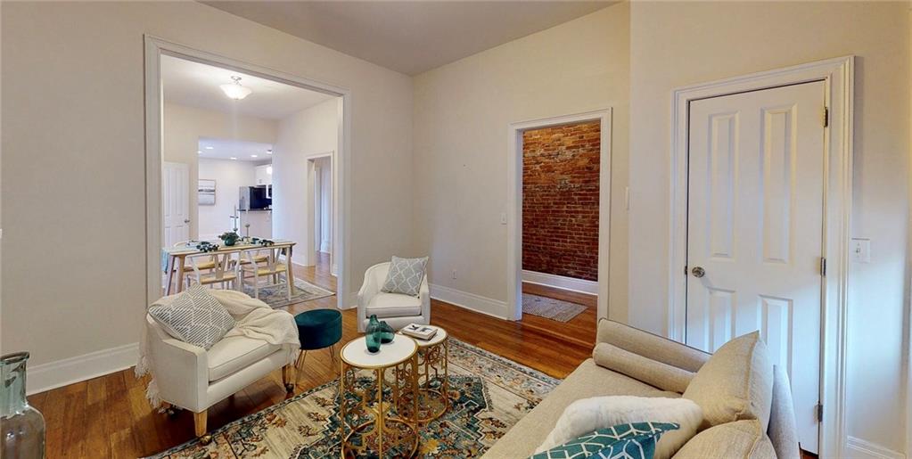 1321 Reddour Street Pittsburgh, PA 15212 - Photo 4 of 21 a living room with furniture and wooden floor
