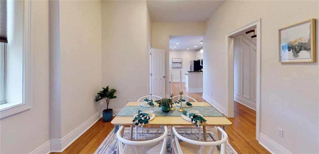 1321 Reddour Street Pittsburgh, PA 15212 - Photo 5 of 21 a room with a potted plant and couches