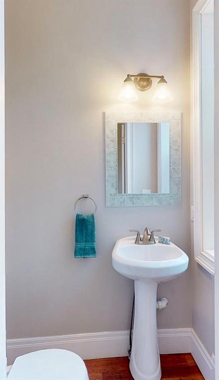 1321 Reddour Street Pittsburgh, PA 15212 - Photo 8 of 21 a bathroom with a sink mirror and toilet