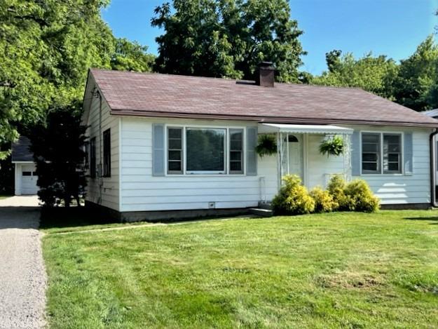 a view of a house with garden