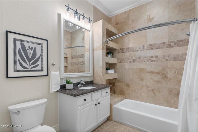 a view of a porch with furniture and a yard