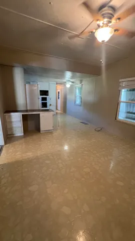 a view of kitchen and a window