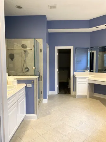 a view of a hallway with washer and dryer