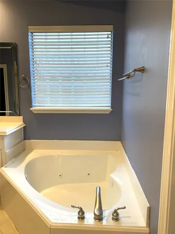a view of a bathtub in a bathroom