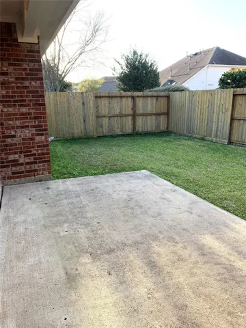 a view of a backyard with a garden