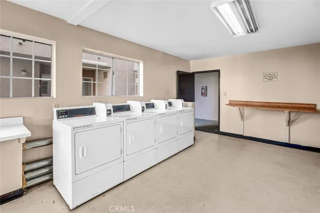 a view of a swimming pool with a yard