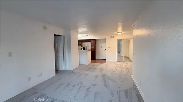 a view of a livingroom with wooden floor