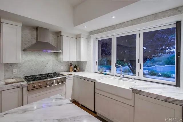 a bed room with a bed and a chair