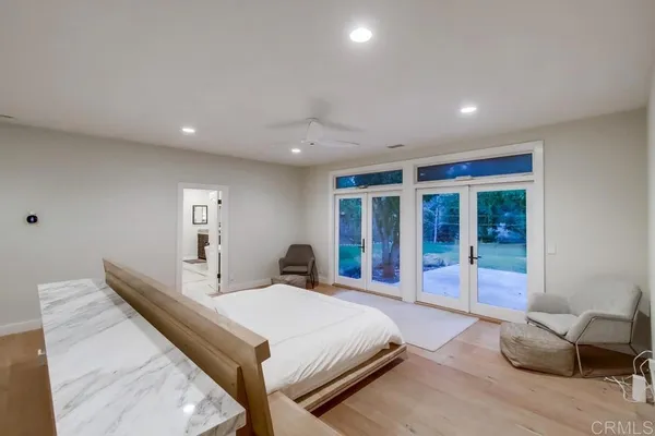 a living room with a couch and a large window