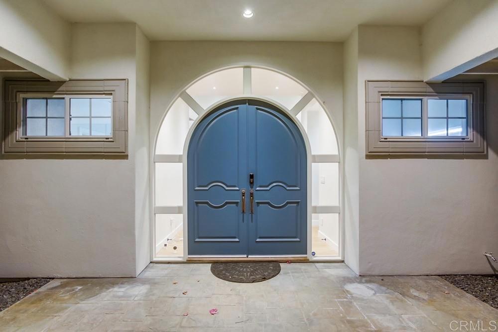 4124 Stonebridge Lane Rancho Santa Fe, CA 92091 - Photo 2 of 31 a view of entrance and door of a house