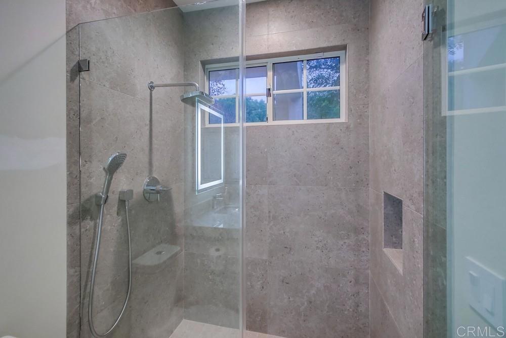 4124 Stonebridge Lane Rancho Santa Fe, CA 92091 - Photo 25 of 31 a bathroom with a shower