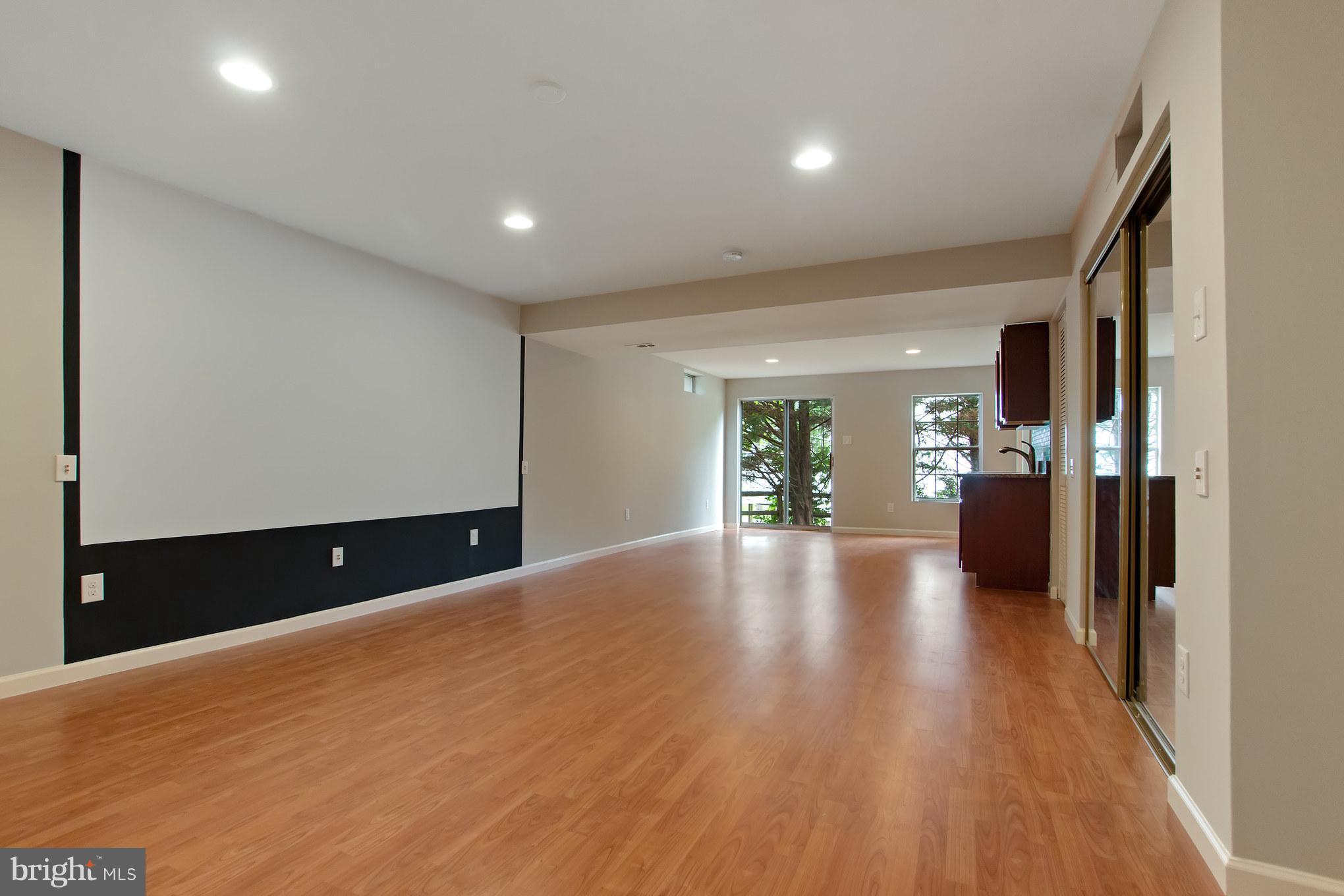 12929 Summit Ridge Terrace Germantown, MD 20874 - Photo 18 of 25 Rec Room w/projector and surround sound
