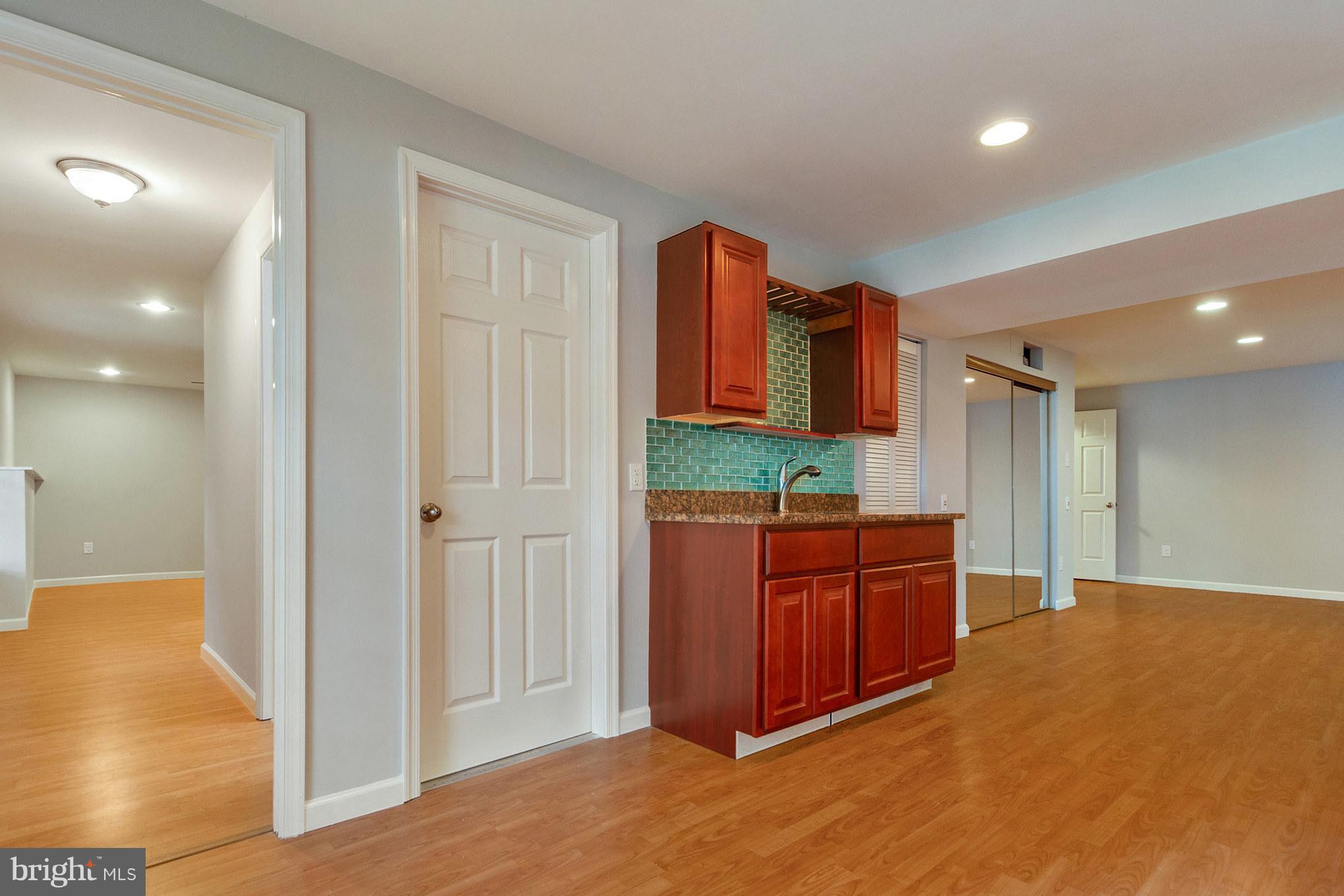 12929 Summit Ridge Terrace Germantown, MD 20874 - Photo 20 of 25 Recreation room w/ wet bar
