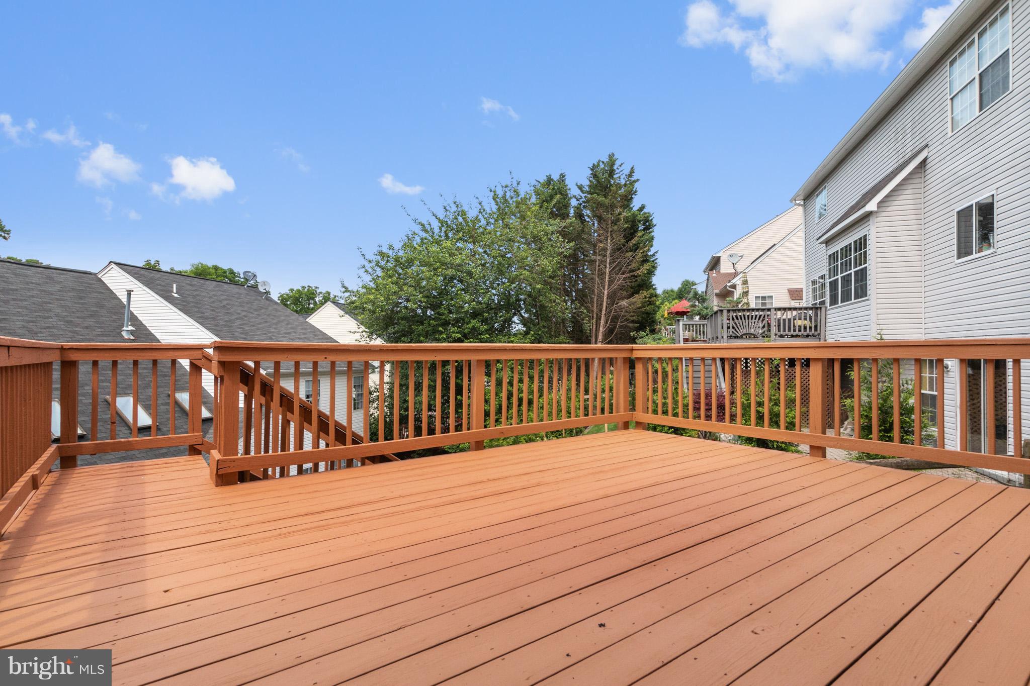 12929 Summit Ridge Terrace Germantown, MD 20874 - Photo 23 of 25 Large deck off of familyroom