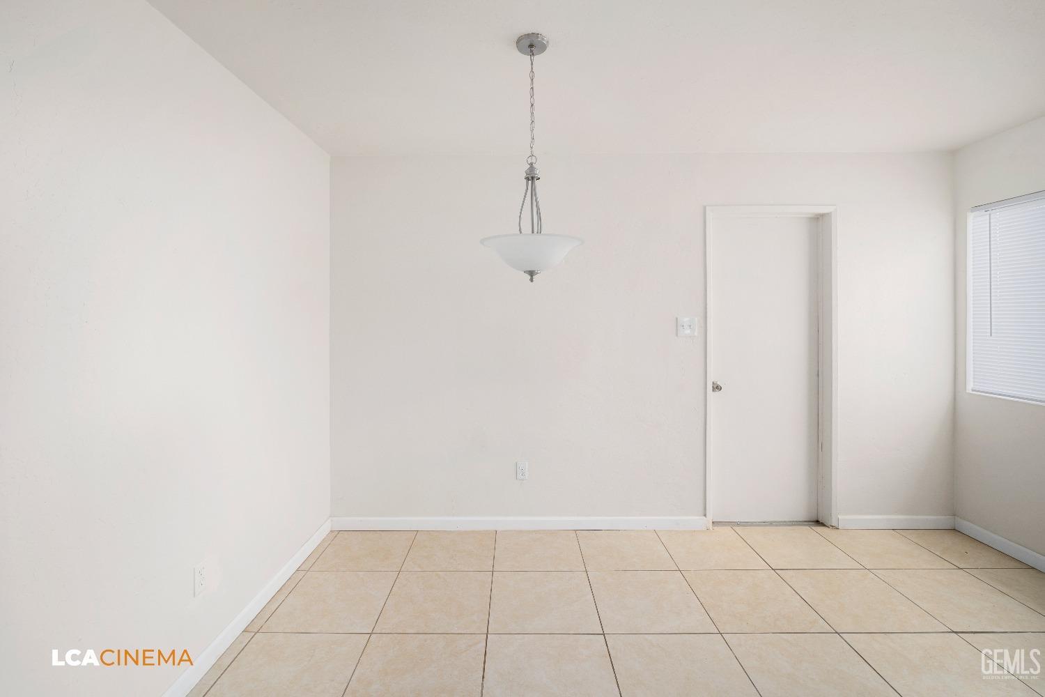 Undisclosed Address Earlimart, CA 93219 - Photo 11 of 18 a view of an empty room