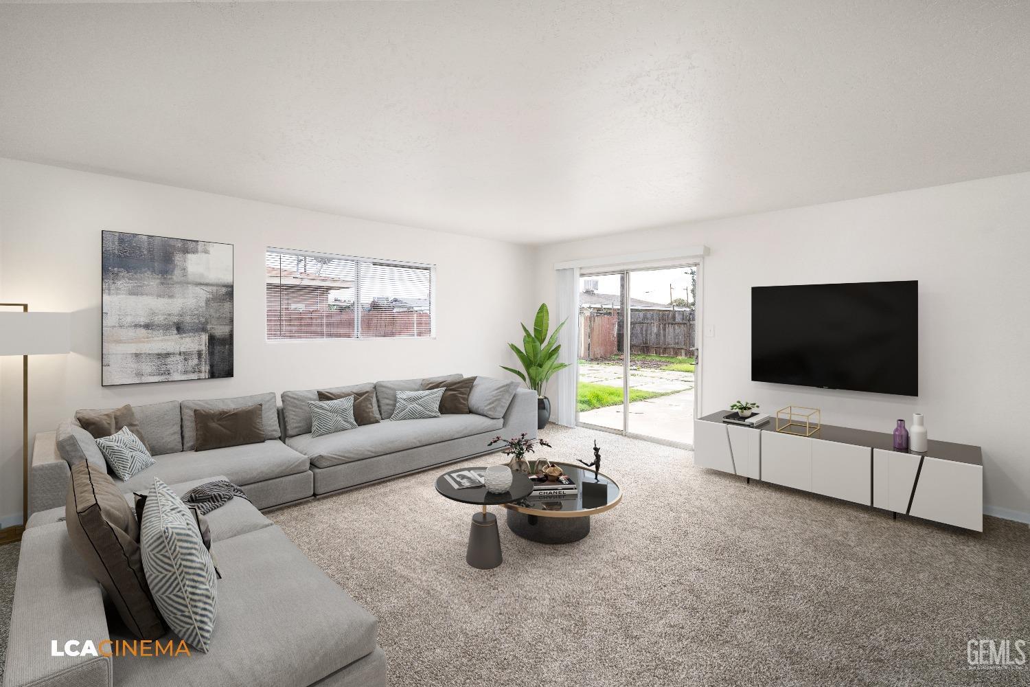 Undisclosed Address Earlimart, CA 93219 - Photo 16 of 18 a living room with furniture and a flat screen tv