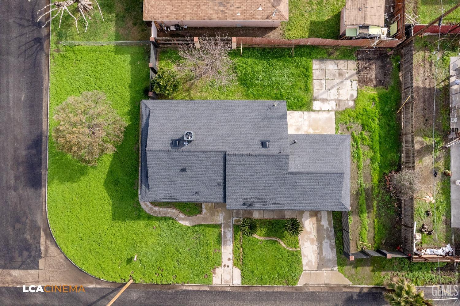 Undisclosed Address Earlimart, CA 93219 - Photo 7 of 18 an aerial view of a house