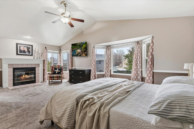 7975 Showcase Lane Sandy, UT 84094 - Photo 14 of 29 Spacious primary bedroom with fireplace, sitting area and large window.