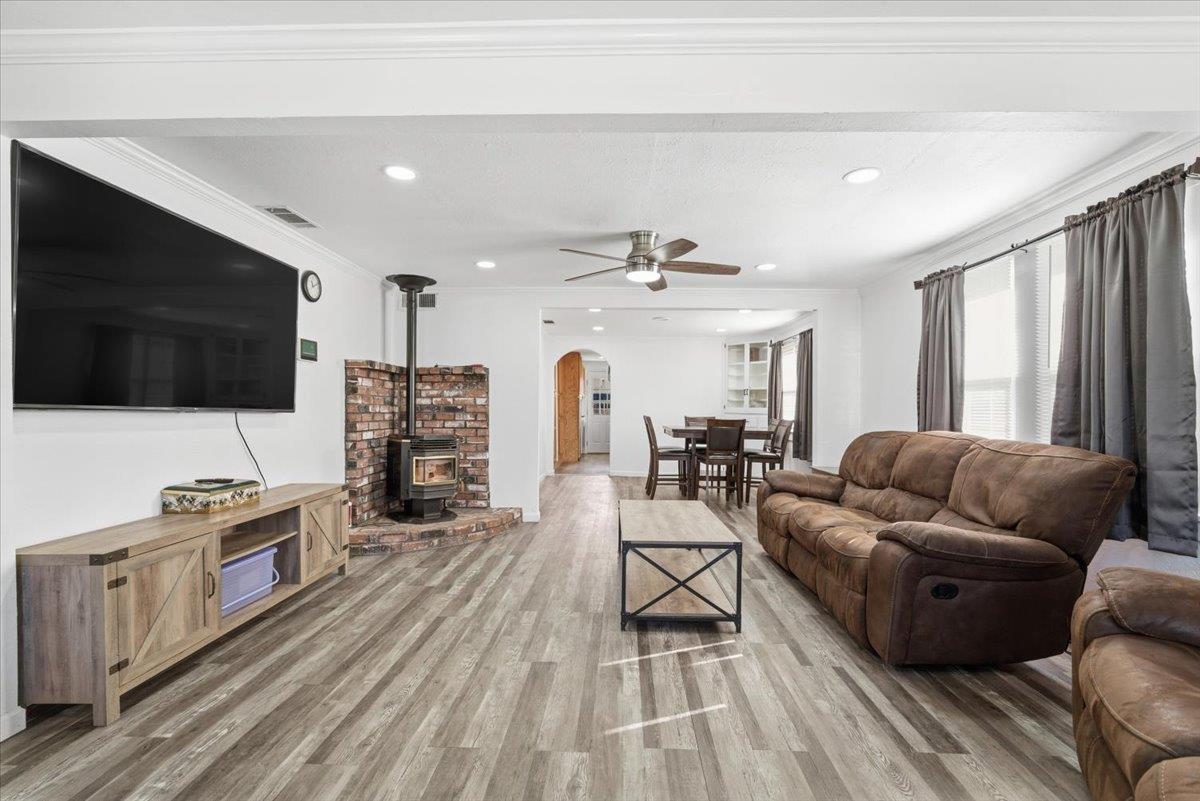 1939 1st Avenue Sutter, CA 95982 - Photo 13 of 35 a living room with furniture and a flat screen tv