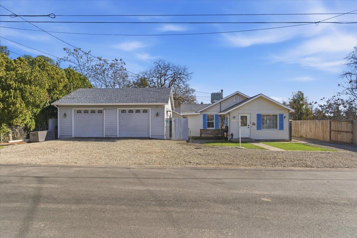 1939 1st Avenue Sutter, CA 95982 - Photo 35 of 35 a front view of a house with a yard and garage