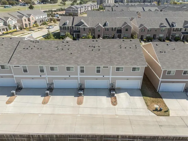 a view of a backyard of the house